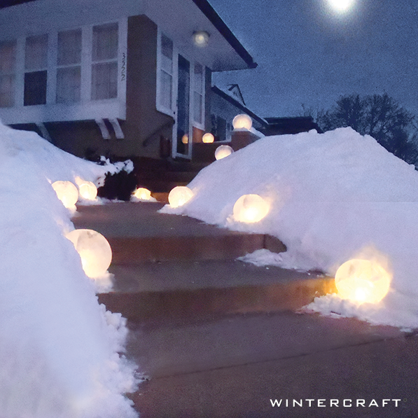 https://www.wintercraft.com/cdn/shop/products/Wintercraft-Line-Walkways-with-Ice-Luminaries-597_6e883a26-1bdc-4cbc-8a1b-b4a51c5a57be_1200x.png?v=1660661084